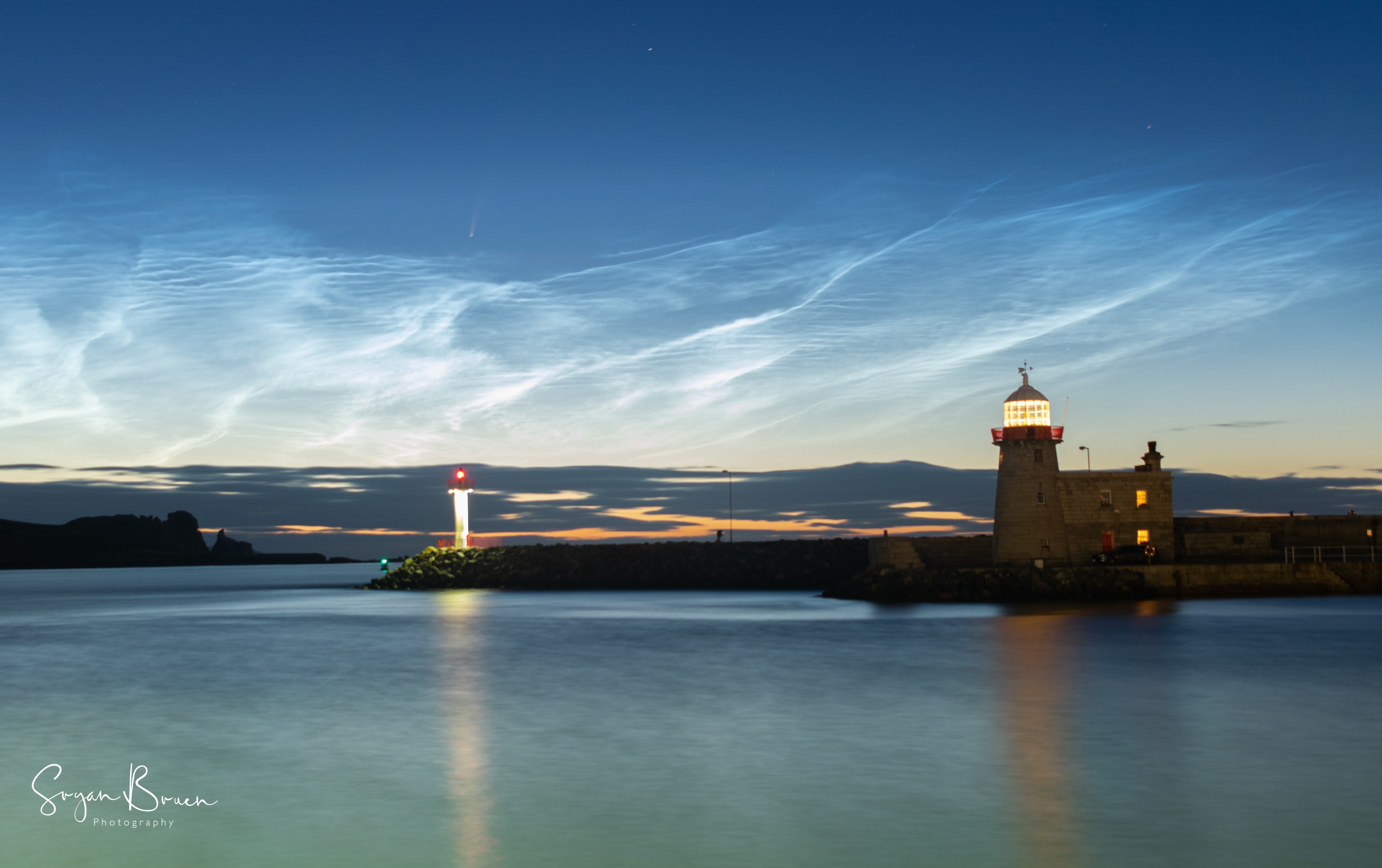 3rd Place Noctilucent clouds and Neowise comet visible at Howth Harbour, Dublin, Ireland by Sryan Bruen @sryanbruenphoto