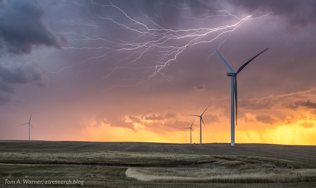 1st Place Lightning streaks above a wind turbine complex in western South Dakota by Tom A. Warner @ztresearch