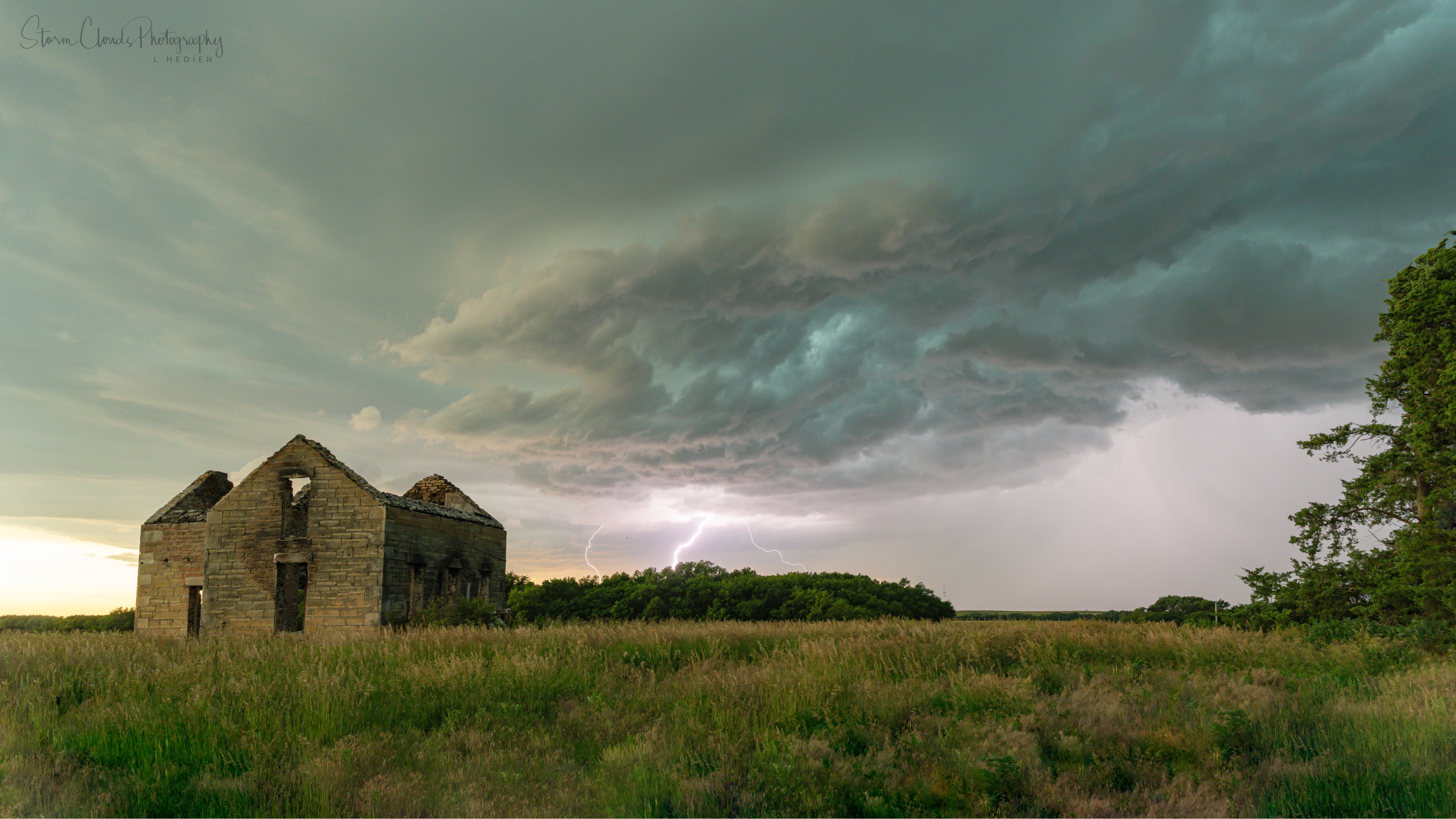 3rd Place Storm approaches an abandoned house on the Great Plains by Laura Hedien @lhedien