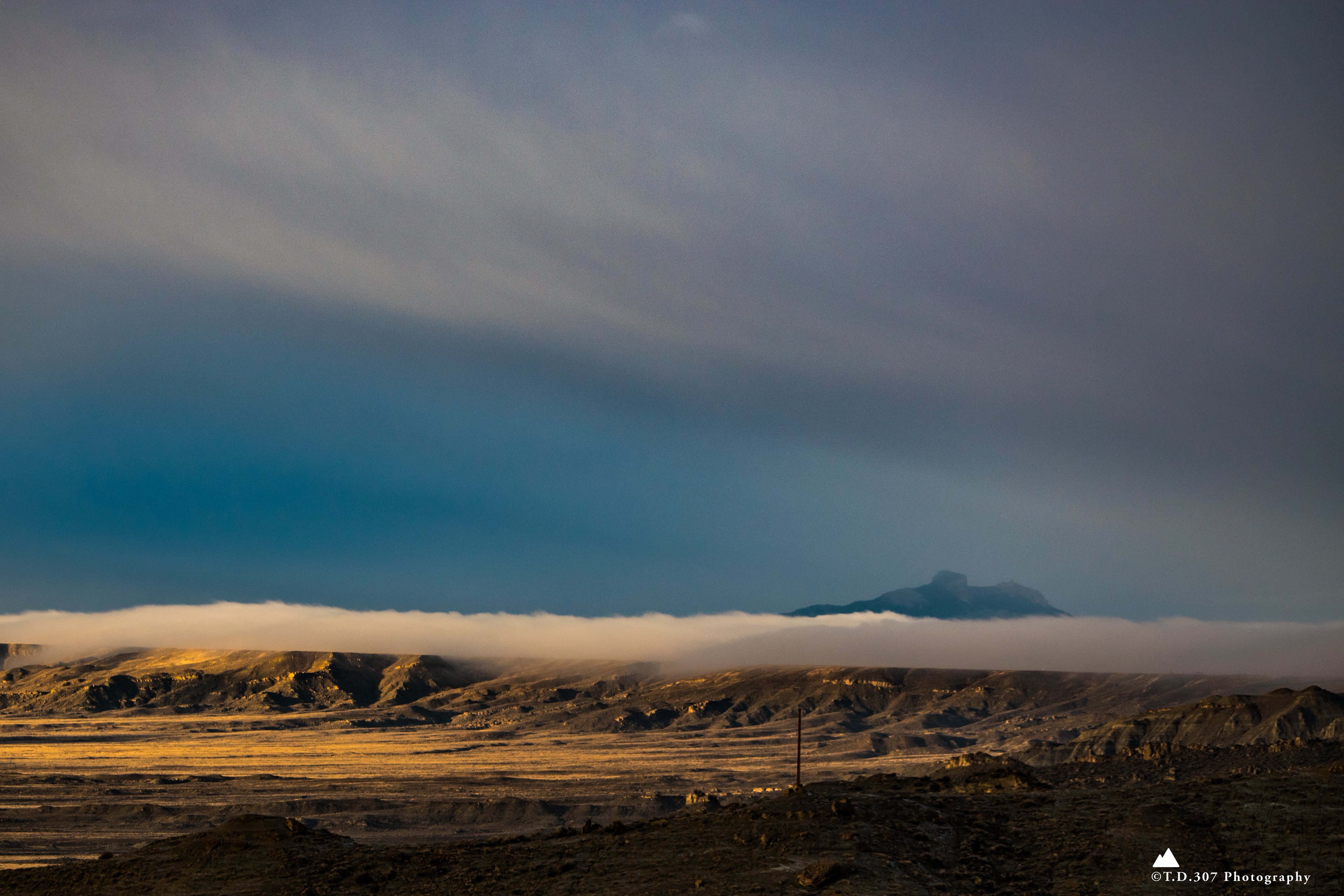 2nd Place Heart Mountain faintly peaks above a roll of fog that feathers down Elk Basin Ridge by TankTopTony @TonyD2155
