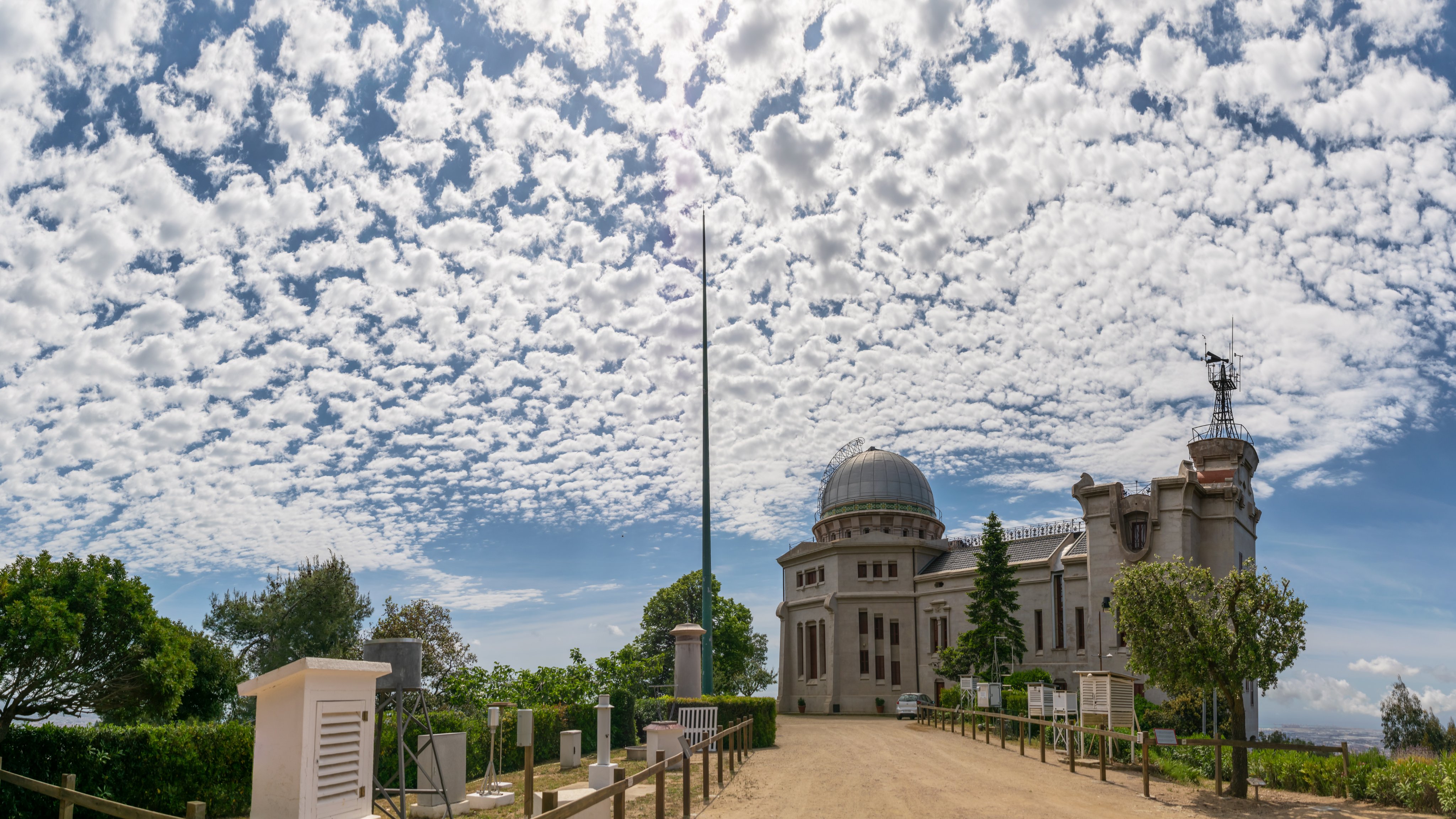 2nd Place Breathtaking sky with a layer of altocumulus clouds from Fabra Observatory by Alfons Puertas @alfons_pc